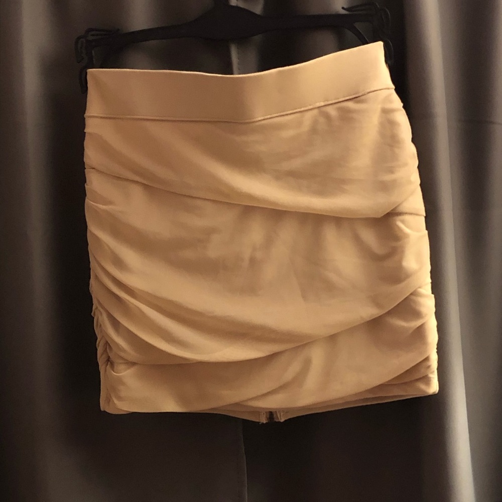 Nude mini skirt